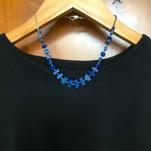Blue stone (Lapis) and silver bead necklace.